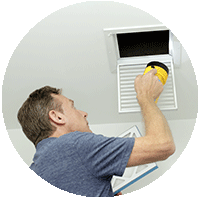 Man checking air filter air quality inspection h9ome health check